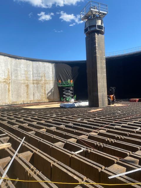 Hanging black geomembrane fabric for a potable water application