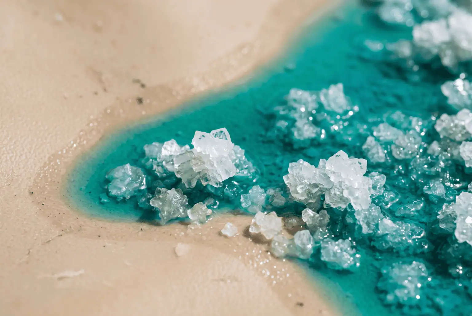 Firefly Gemini Flash Close up of saturated turquoise brine with salt crystals resting on a smooth light ta 510463